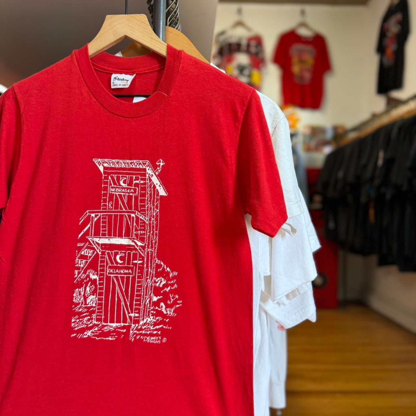 Vintage 80s Nebraska Huskers Oklahoma Sooners Outhouse T-Shirt