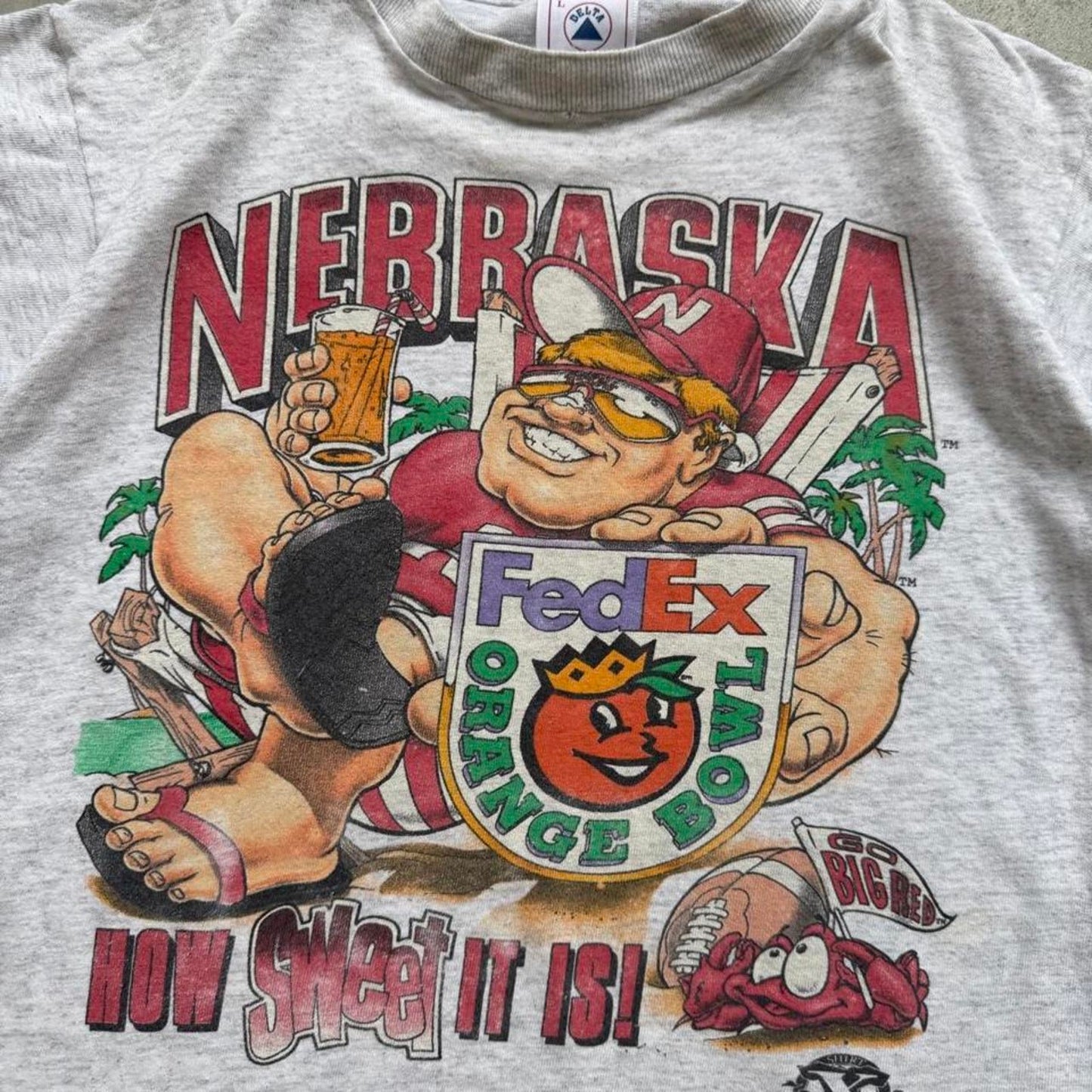 Vintage 90s Nebraska Husker Herbie Beach Orange Bowl T-Shirt - Kids Large